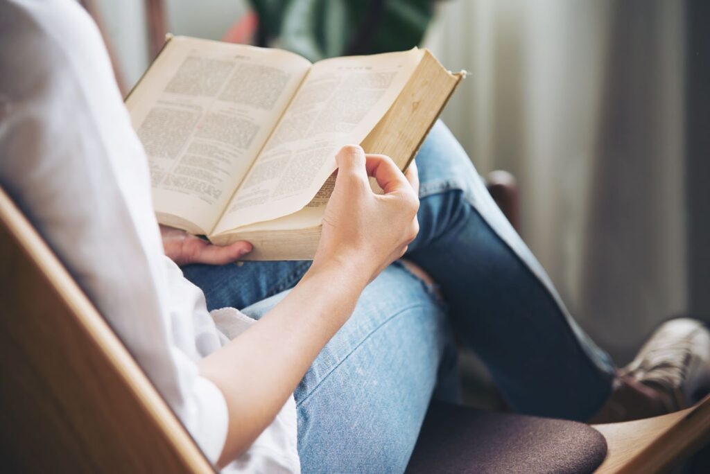 A woman is reading a book