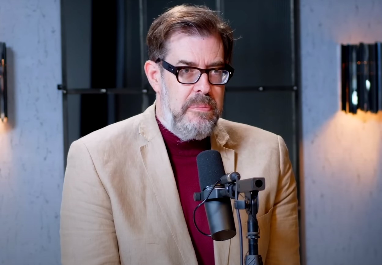 Richard Osman during in glasses during an interview